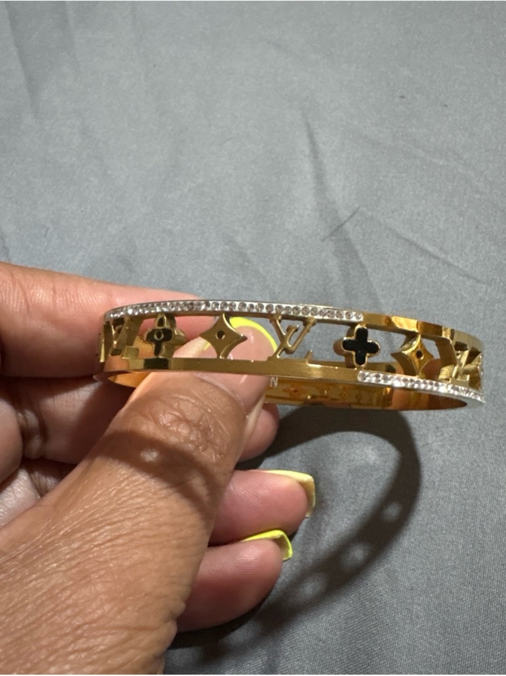 Gold Logo Cutout Bangle Bracelet with Crystal Accents - Designer Style